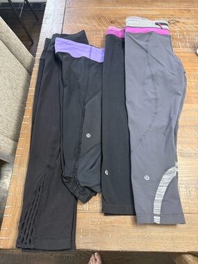 Lululemon woman’s Active Capri Leggings - Black, Gray, Purple Accents